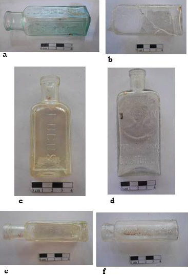 Figura 9. a: frasco de Magnesia P.A Alberdi e Ituzaingo; b: frasco de Magnesia P.A. La Caridad; c: frasco aceite de Ricino Fucus P.A. Cabildo; d: frasco de Castor Oil P.A. Cabildo; e: frasco de aceite de Ricino P.A. Cabildo; f: frasco de Pepsina. P.A. San Agustín